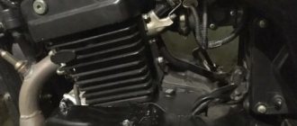 Cooling fins on the cylinder block of the Desert Raven Nevada 350i motorcycle